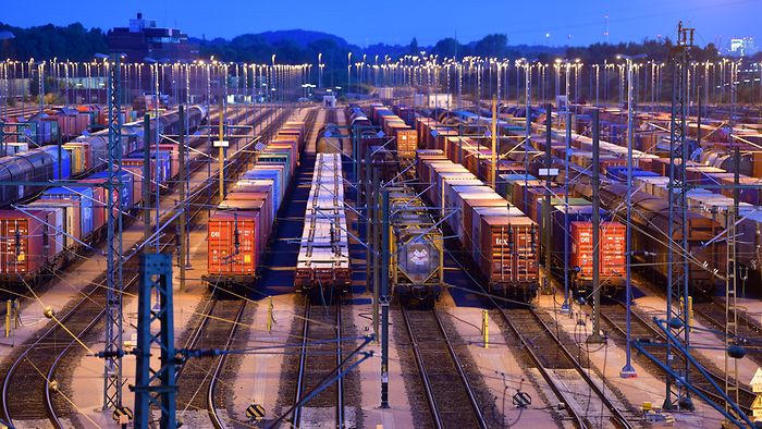 Marshalling yard rows of rails and rows of wagons in the morning mood