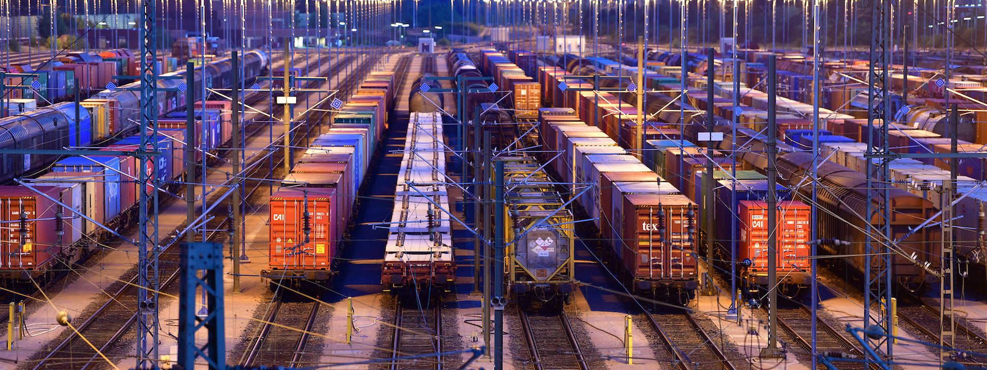Marshalling yard rows of rails and rows of wagons in the morning mood