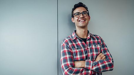 Young man in a check shirt.